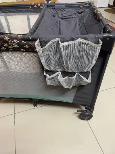Create a safe, versatile, and fun space for your little one with this Bee All-in-One Play Yard