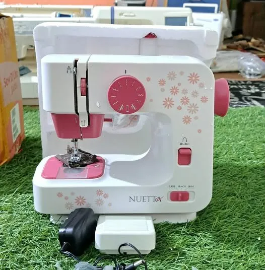 Mini.size sewing machine - photo 1
