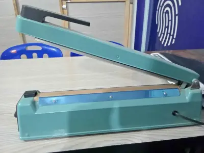 New Impulse Sealer Soft Plastic Coating Machine with Box In Karachi