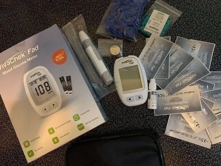 Using Viva check glucometer to check blood sugar - photo 1